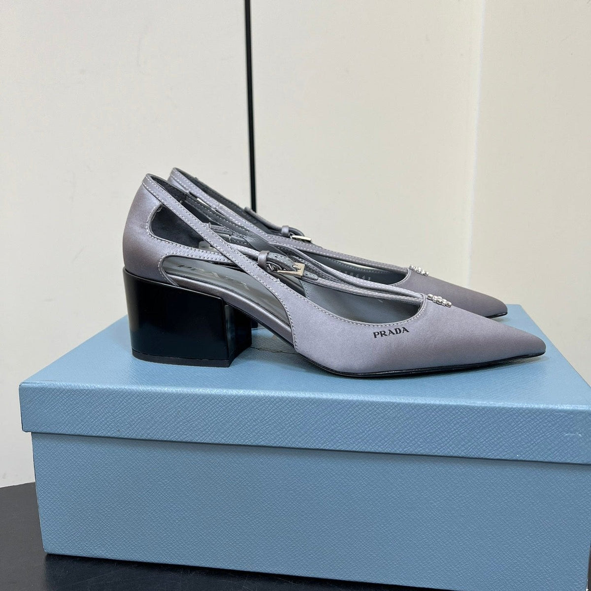 CUT-OUT PUMPS WITH BEAD BUCKLE IN WARM GRAY SATIN