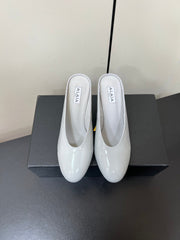 ALAIA WEDGE MULES 25S IN WHITE LAMBSKIN