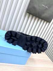 PRADA 25S MONOLITH BOOTS IN BLACK SUEDE