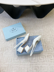 TRIANGLE LOGO SLINGBACK PUMPS WITH BOW IN WHITE CALFSKIN
