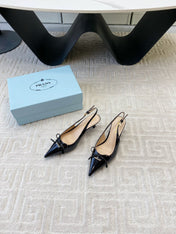 SLINGBACK PUMPS ATTACHED BOW IN BLACK GLOSSY CALFSKIN