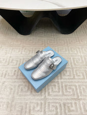 TASSEL MULES IN SILVER METALLIC LAMBSKIN