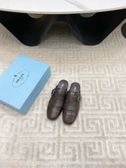 TASSEL MULES IN WALNUT BROWN LAMBSKIN