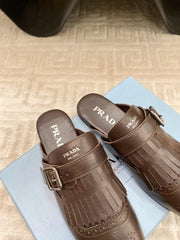 TASSEL MULES IN WALNUT BROWN LAMBSKIN