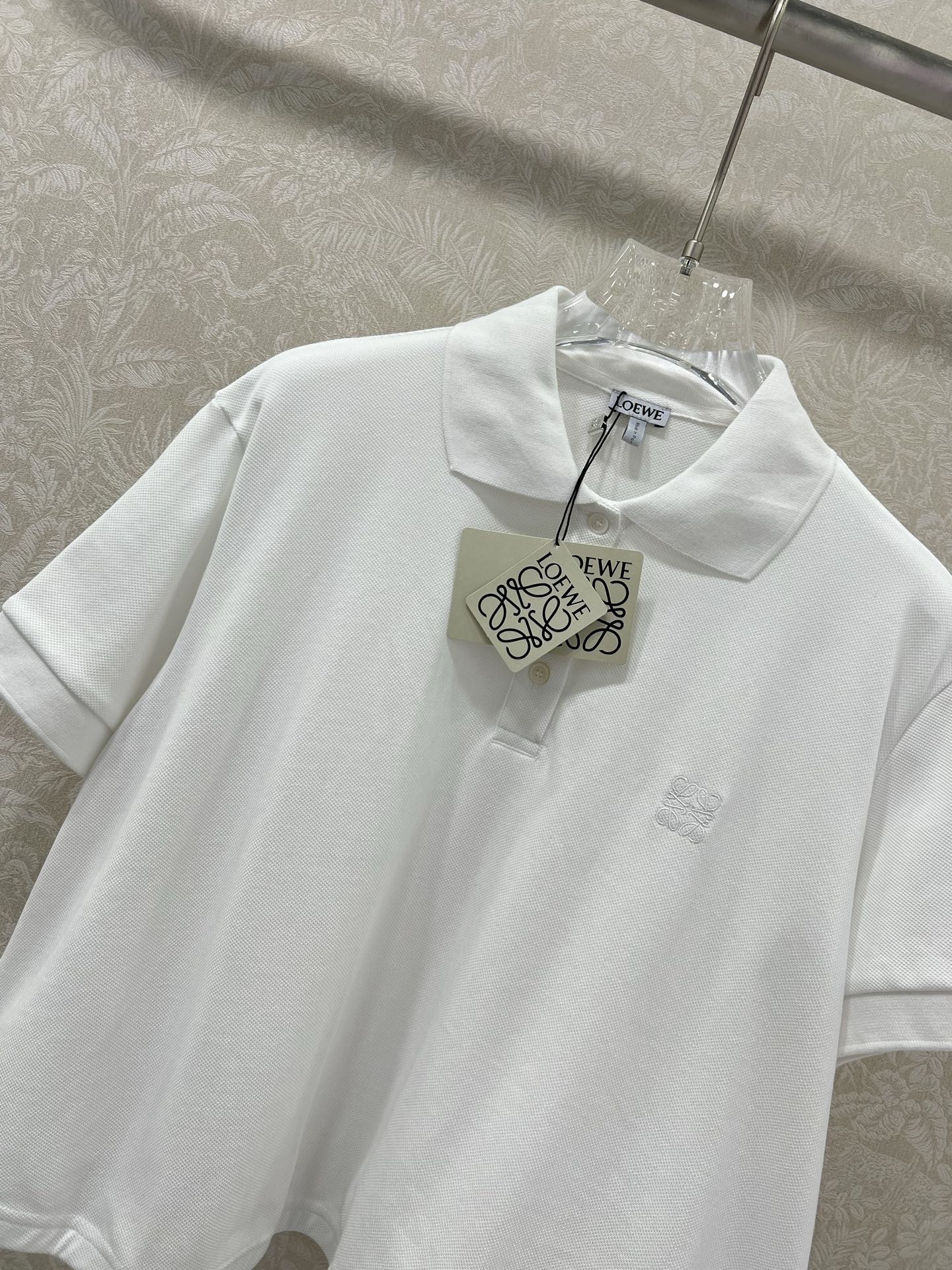 LOEWE OVERSIZED CROPPED POLO SHIRT WITH EMBROIDERED LOGO IN WHITE