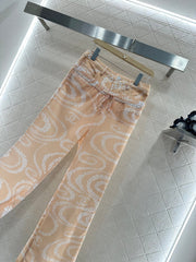 CHANEL BEIGE PRINTED DENIM PANTS