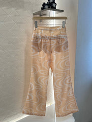 CHANEL BEIGE PRINTED DENIM PANTS