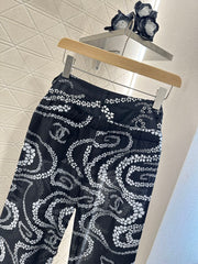 CHANEL BLACK PRINTED DENIM PANTS