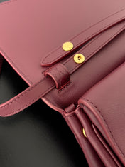BEL AIR CLUTCH 27 IN BURGUNDY RED NAPPA LAMBSKIN GOLD HARDWARE