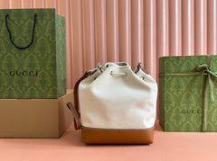 DRAWSTRING SHOULDER BAG LOGO PRINT 31 IN WHITE CANVAS BROWN CALFSKIN