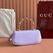 BAMBOO DIVE MEDIUM BAG 27 IN LILAC CALFSKIN RESIN BRASS BAMBOO-SHAPED HARDWARE