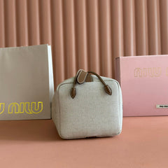 BUCKET BAG 22 BEIGE AND BRANDY IN CANVAS