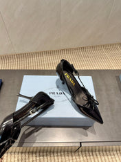 PRADA 26S POINTED TOE CUT OUT HIGH HEELS 75MM IN BLACK CALFSKIN WITH BOW