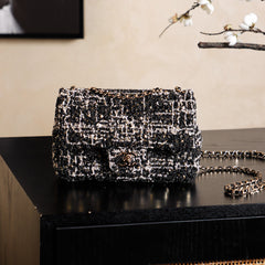 CHANEL 25S FLAP BAG 21 CM IN BLACK SEQUINED TWEED WITH GOLD HARDWARE