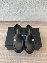 CC MOCCASIN SLINGBACK IN BLACK CALFSKIN