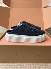 WASH SNEAKER MULES IN DARK NAVY DENIM