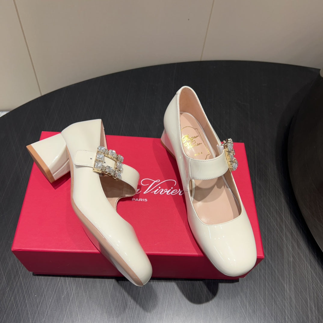 ROGER VIVIER 25S TRÈS VIVIER 50MM IN IVORY CALFSKIN WITH RHINESTONE BUCKLE