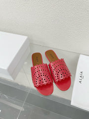 ALAIA VIENNE FLAT MULES IN CHERRY RED LAMBSKIN