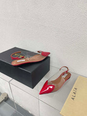 ALAIA LE COEUR FLAT SLINGBACKS IN CHERRY RED PATENT LAMBSKIN