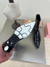 ANKLE POINTED-TOE BOOTS IN BLACK GLOSSY CALFSKIN
