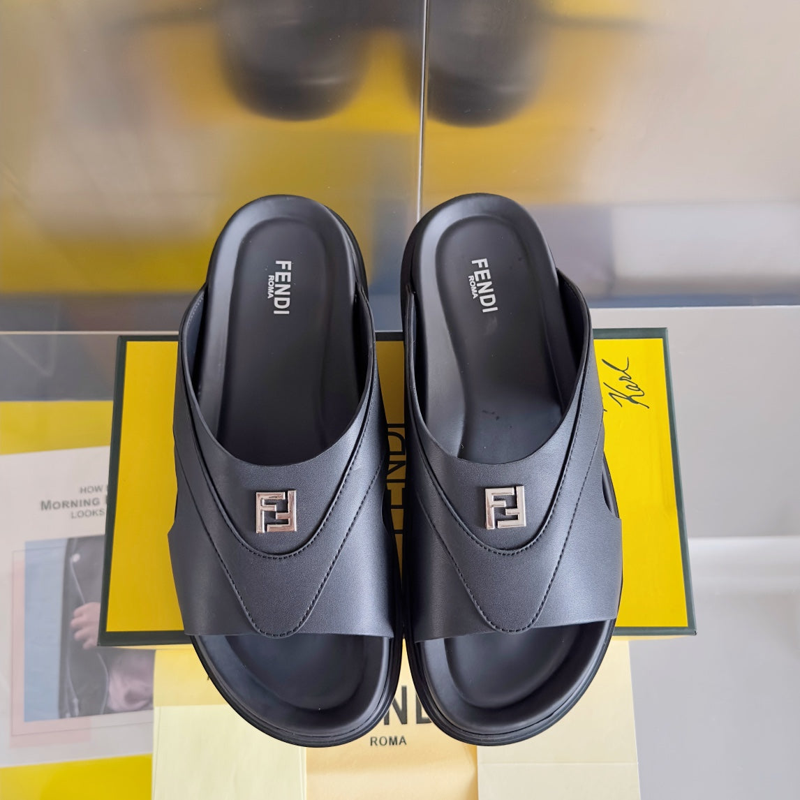 FENDI DIAGONAL ONE-STRAP SLIDE IN BLACK CALFSKIN AND RUBBER