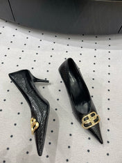 HEELED PUMPS 65 MM IN BLACK LIZARD PATTERN CALFSKIN GOLD HARDWARE