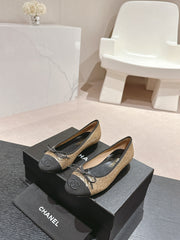 BALLET FLATS IN GOLDEN GLITTERED TULLE AND BLACK SATIN