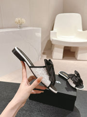 BOW LADY SLIPPERS BLACK LAMBSKIN WITH WHITE RHINESTONES