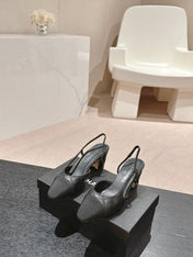 HIGH SLINGBACKS IN BLACK LAMBSKIN AND SATIN