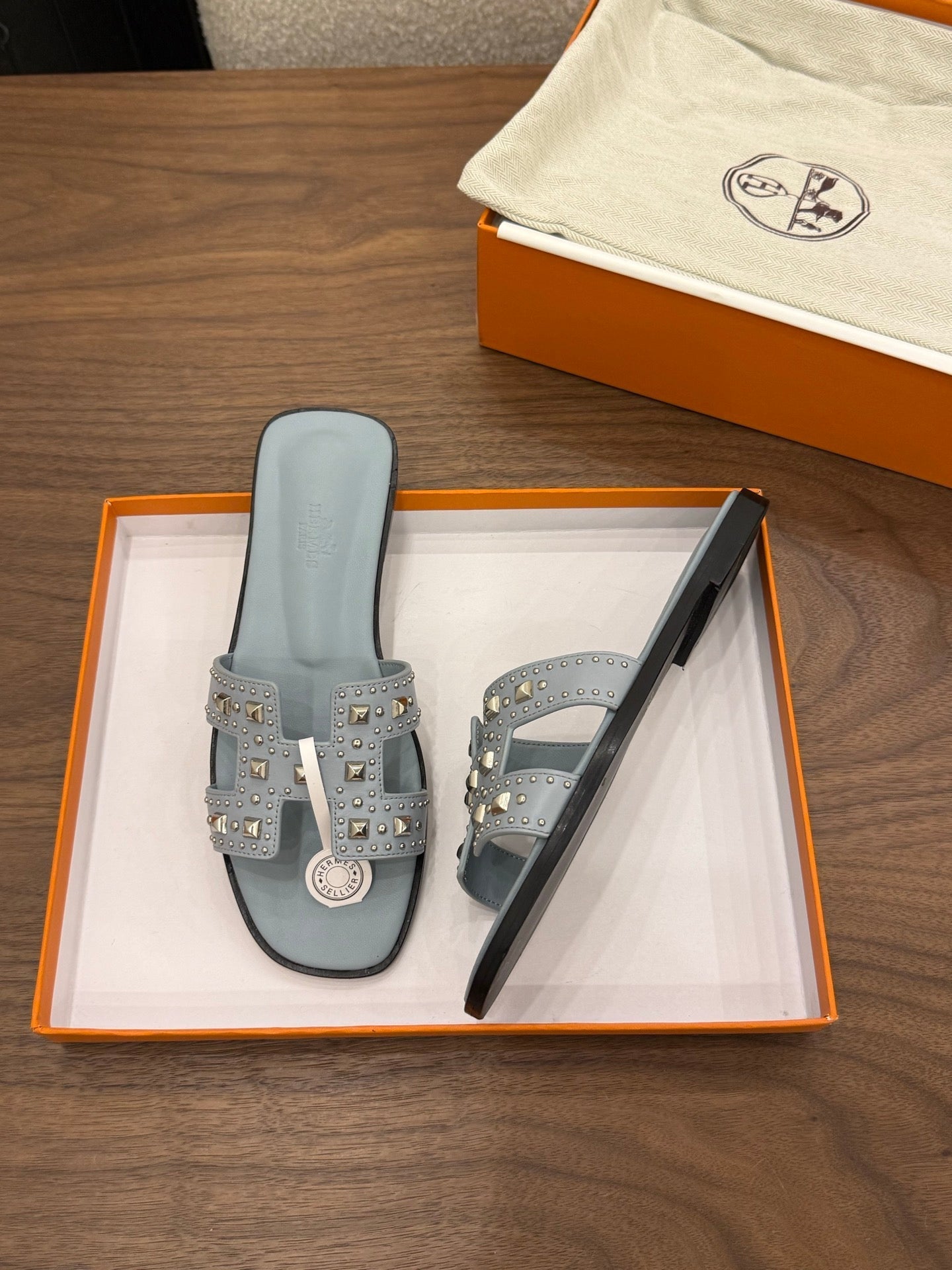 HM 26S ORAN STUDDED SANDALS IN DUSTY BLUE CALFSKIN