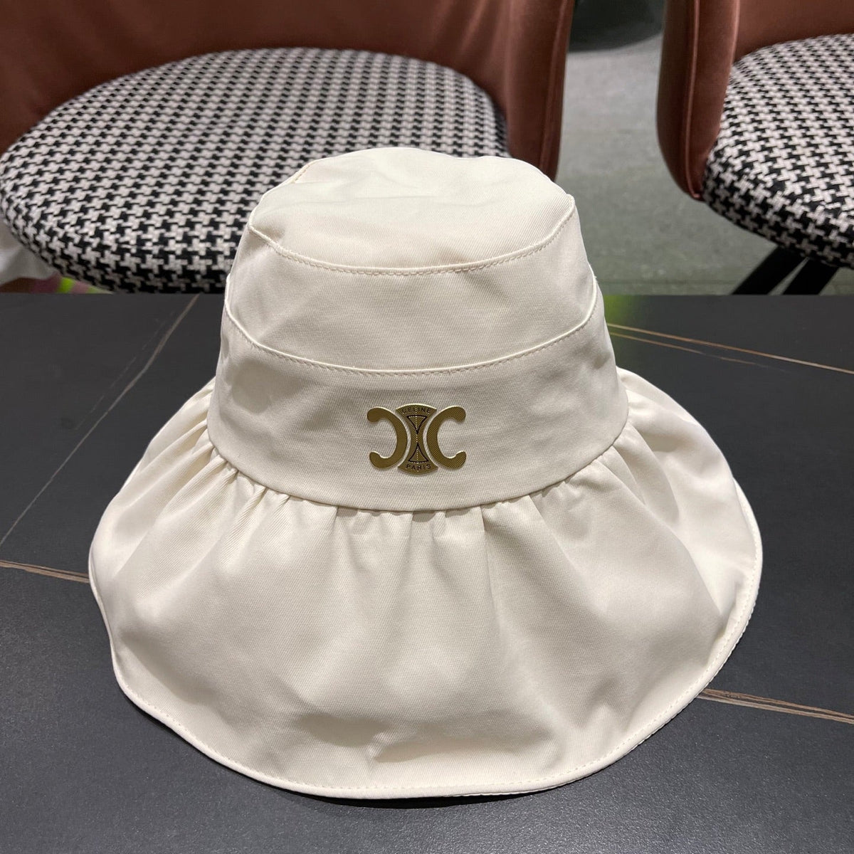 CELINE 25S BUCKET HAT 734983 IN WHITE