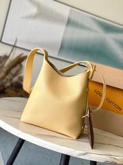 LOW KEY HOBO PM 28 IN URBAN YELLOW CALFSKIN GOLD BUCKLE