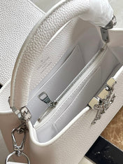 CAPUCINES EAST-WEST MINI 22 IN WHITE CALFSKIN SILVER HARDWARE