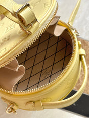 MINI BOITE CHAPEAU 13 IN BANANA YELLOW MONOGRAM PERFORATED CALFSKIN