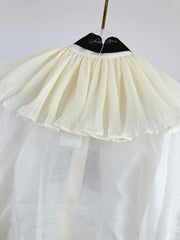 WHITE DRESSY TOP WITH BLACK TIE-NECK
