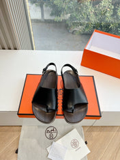 FLAT SANDAL IN BLACK CALFSKIN