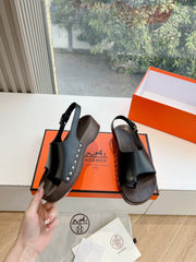 FLAT SANDAL IN BLACK CALFSKIN