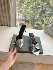 CAGOLE MID-HEEL MULES IN SILVER METALLIC CALFSKIN