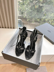 CAGOLE HIGH-HEEL SANDALS IN BLACK LAMBSKIN