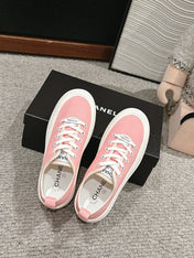 LACE-UP SNEAKERS IN PASTEL PINK CANVAS