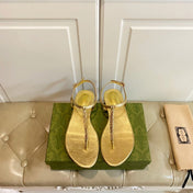 GG SIGNORINA THONG SANDALS IN GOLD SHEEPSKIN