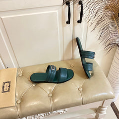 GG SANDAL WITH ROUND INTERLOCKING G IN DARK GREEN CALFSKIN