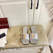 GUCCI 26S SLIDES IN SILVER CALFSKIN