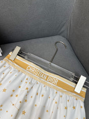 WHITE FLARED SKIRT WITH PRINT