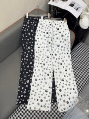 ALL-OVER LOGO PRINTED PANTS WITH STRETCH WAIST