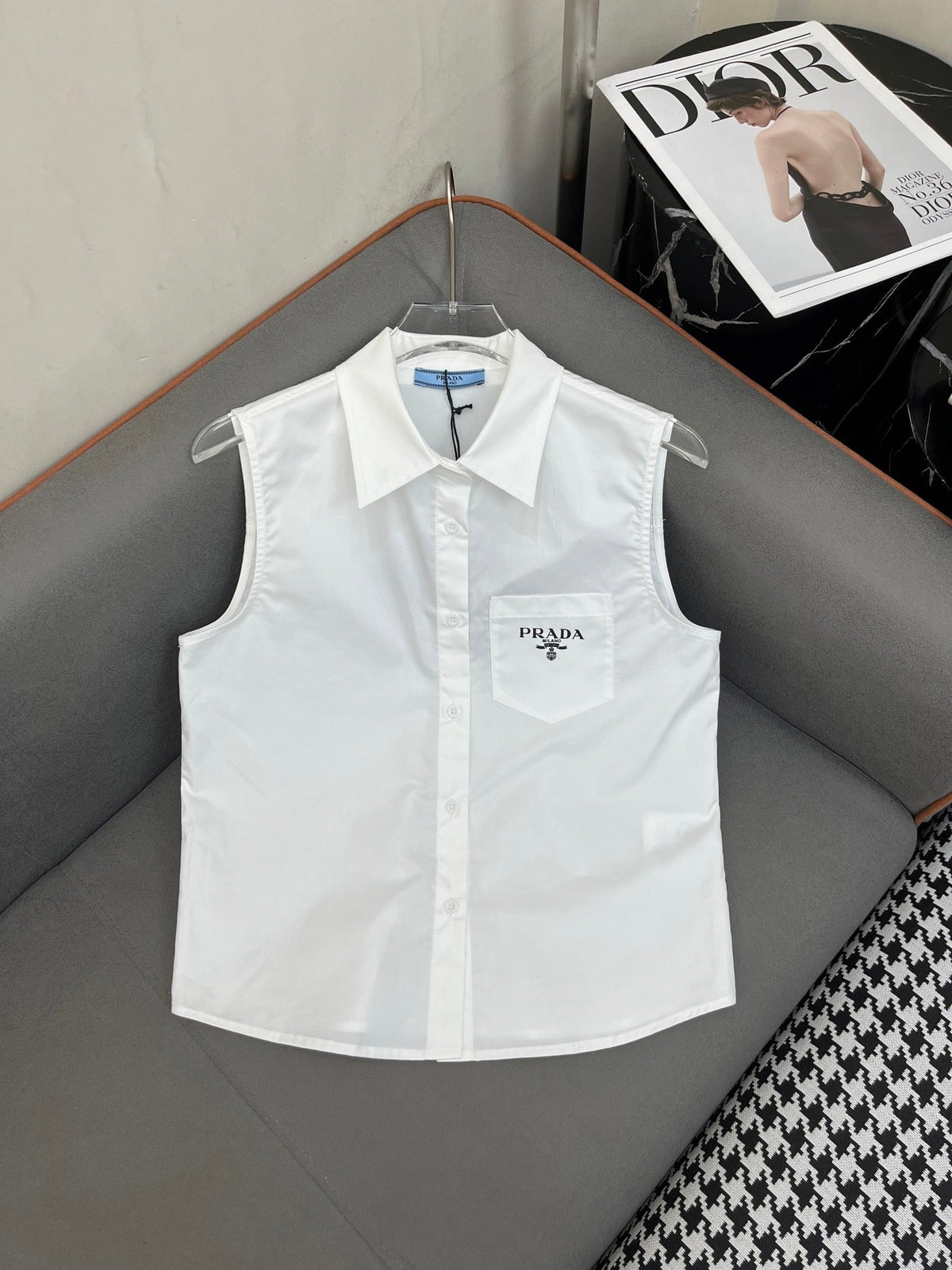 WHITE SLEEVELESS BUTTON-UP SHIRT