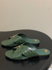 FLAT SLIPPERS IN MOSS GREEN CALFSKIN SNAKE EMBOSSING