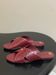 FLAT SLIPPERS IN RED CALFSKIN SNAKE EMBOSSING