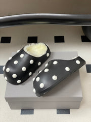BALENCIAGA 25S FUR-LINED MULES IN BLACK AND WHITE FAUX LEATHER