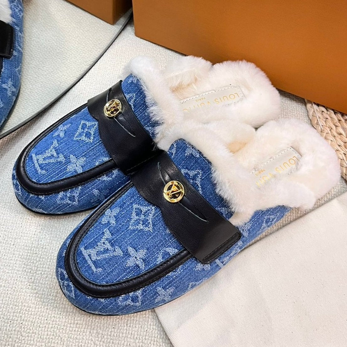 FLAT MULE IN COBALT BLUE MONOGRAM DENIM AND SHEARLING LINING